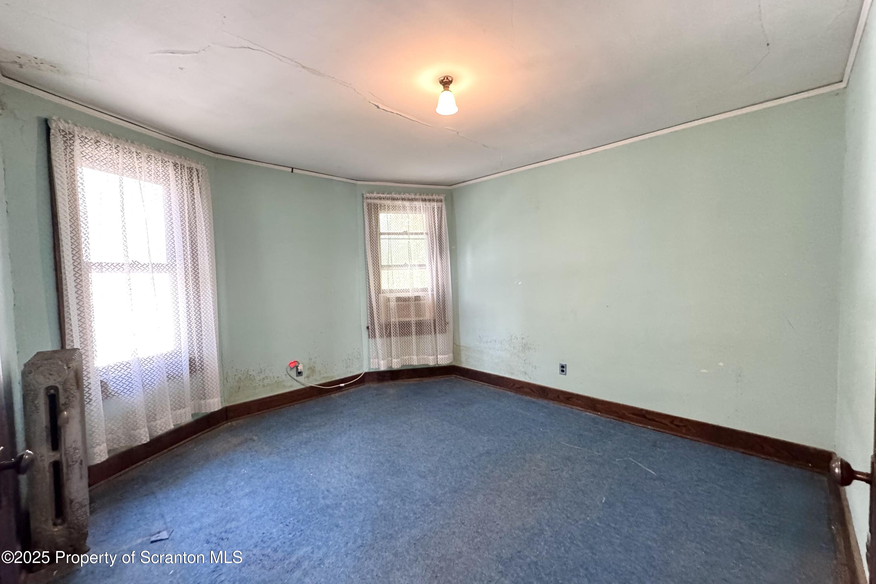 413 Powell Avenue Clarks Summit, PA 18411 - Photo 17 of 31 an empty room with windows