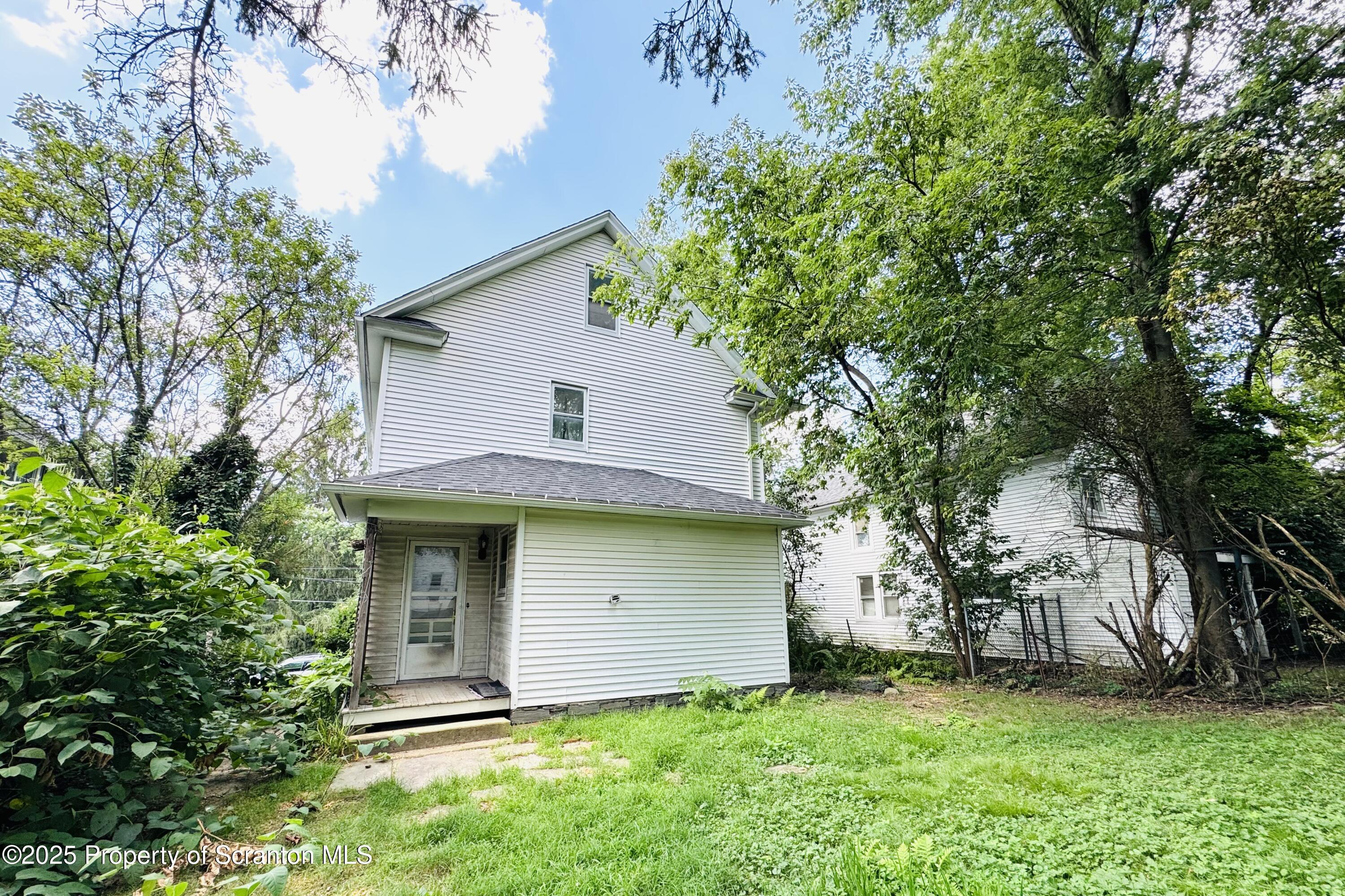 413 Powell Avenue Clarks Summit, PA 18411 - Photo 29 of 31 a view of a backyard of the house