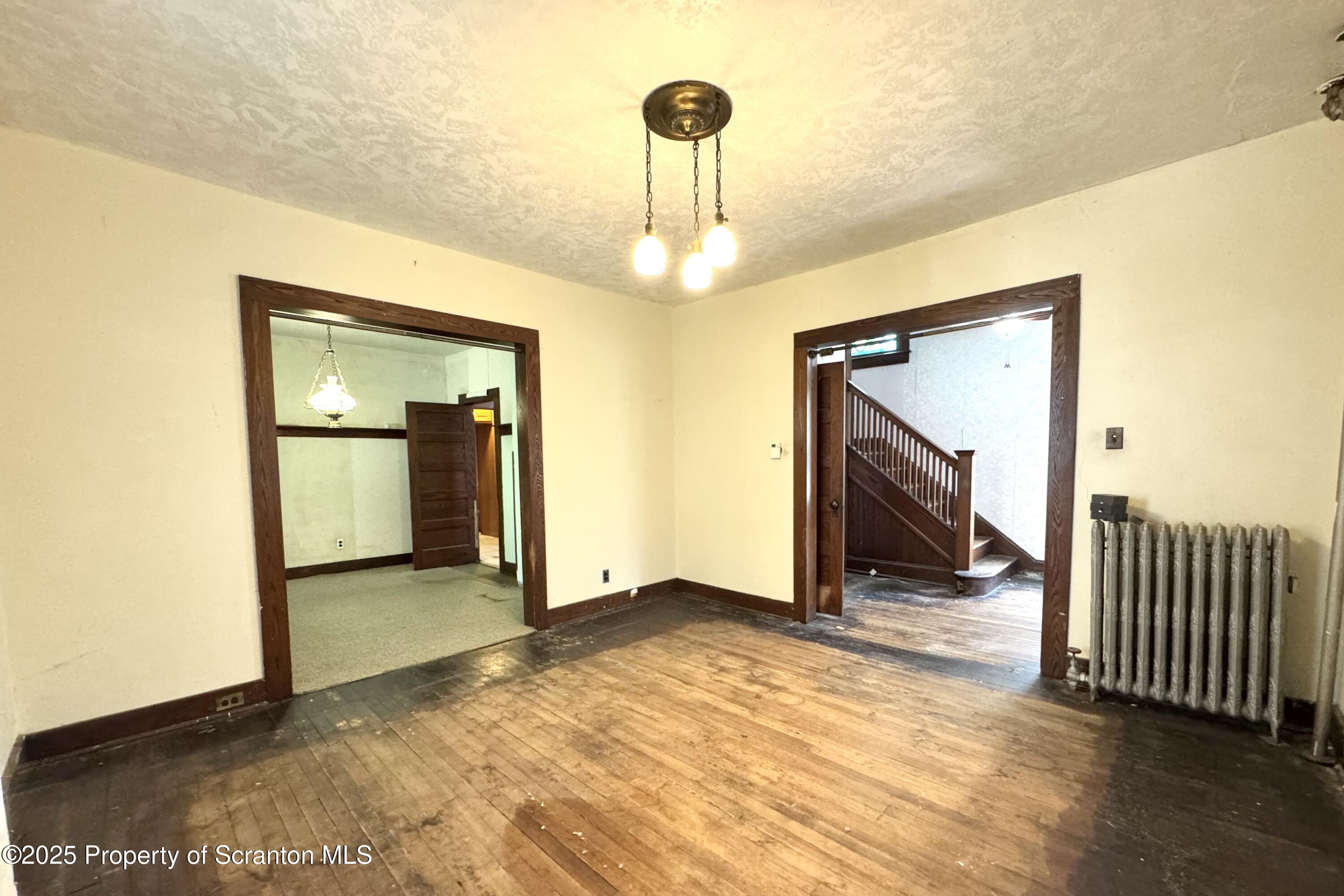 413 Powell Avenue Clarks Summit, PA 18411 - Photo 4 of 31 a view of an empty room
