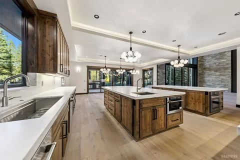 a kitchen with a stove and a sink
