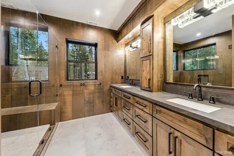 a bathroom with a window bathtub and sink