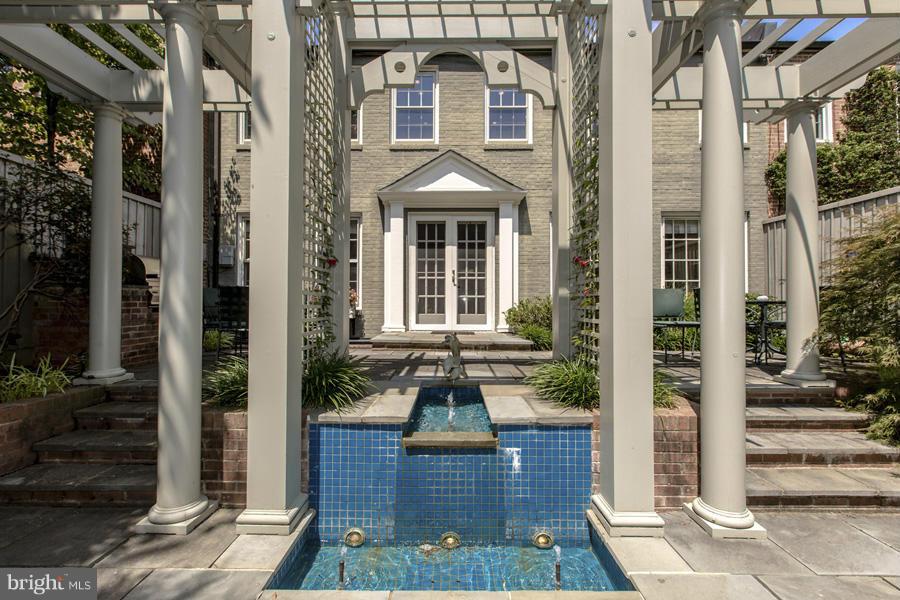 2810 R Street Northwest Washington, DC 20007 - Photo 12 of 14 a front view of a house with a yard