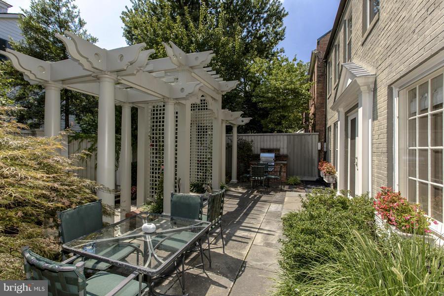 2810 R Street Northwest Washington, DC 20007 - Photo 13 of 14 a view of backyard of house with outdoor seating