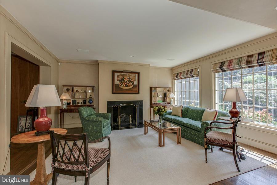 2810 R Street Northwest Washington, DC 20007 - Photo 3 of 14 a living room with furniture and a fireplace