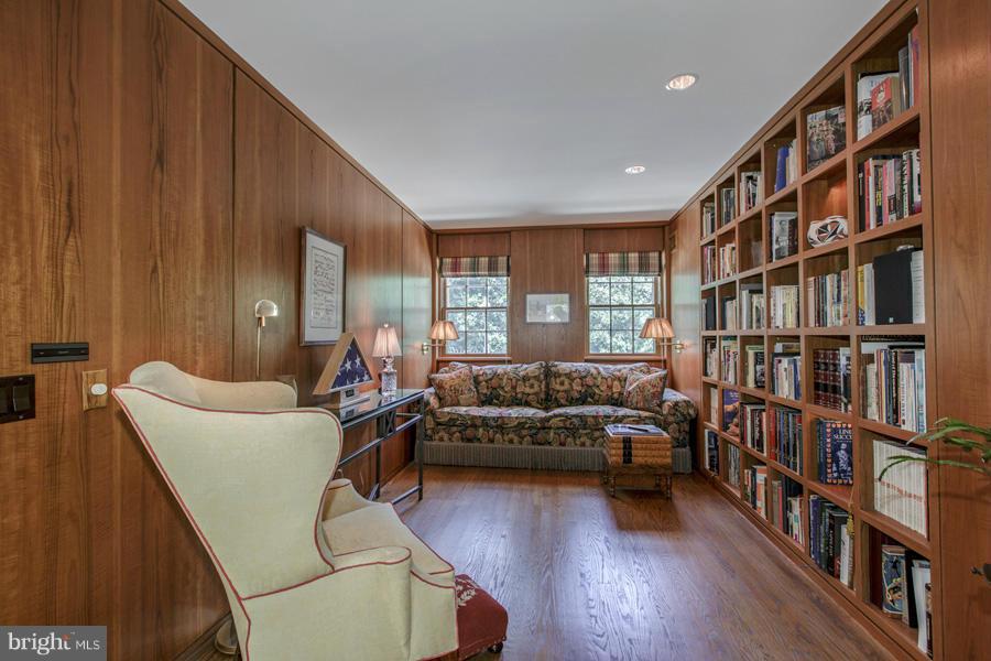 2810 R Street Northwest Washington, DC 20007 - Photo 6 of 14 a living room with furniture and a book shelf