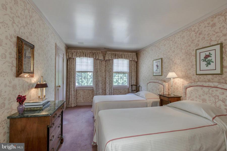 2810 R Street Northwest Washington, DC 20007 - Photo 8 of 14 a bed room with two beds and a window