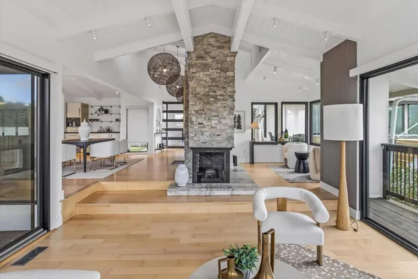 a bathroom with a double vanity sink mirror and shower
