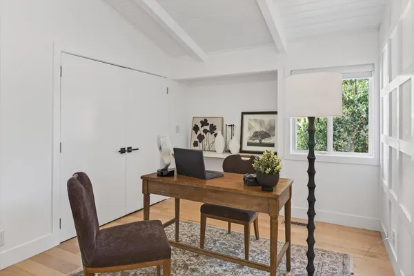 a kitchen with stainless steel appliances a stove a sink and a refrigerator