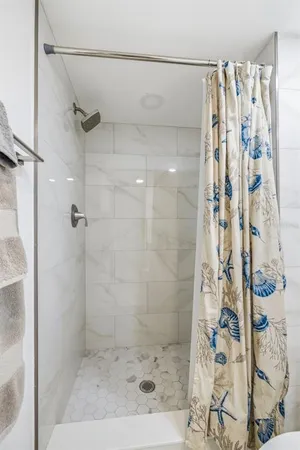 a utility room with sink dryer and washer