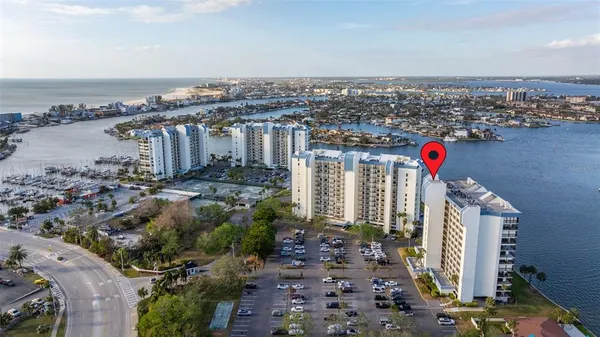 an aerial view of beach and city