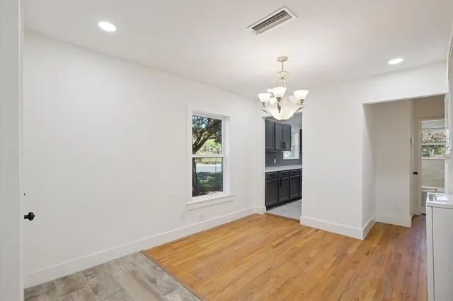 a view of a livingroom with wooden floor