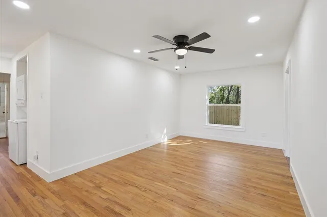 a view of an empty room and window