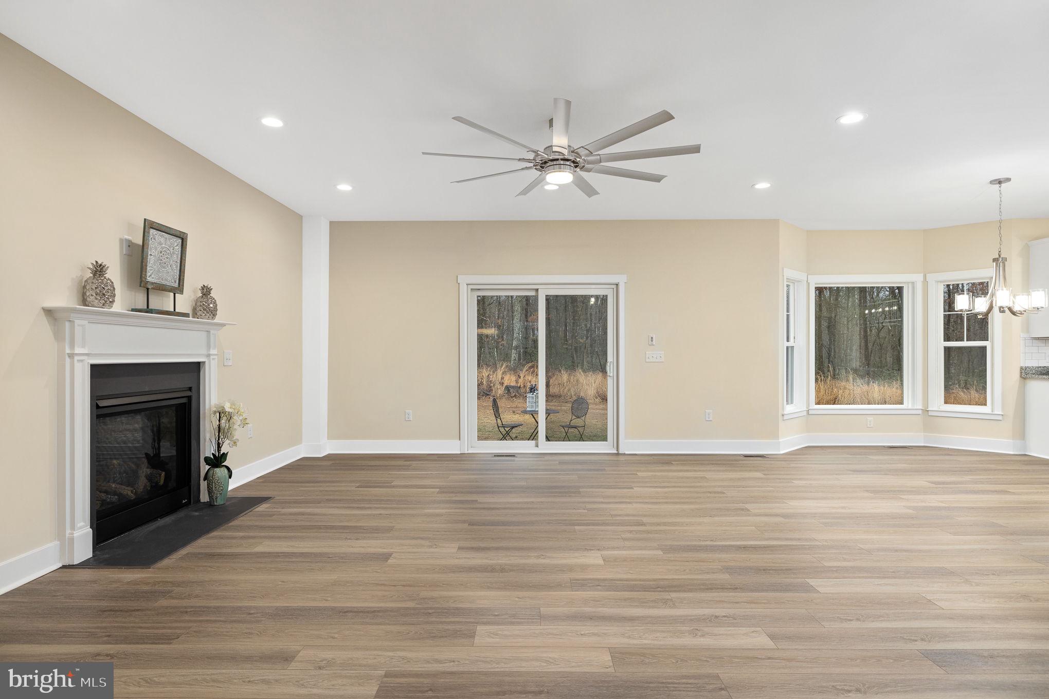 29332 Old Rhoadesville, VA 22542 - Photo 5 of 40 Gas fireplace in Great Room ceiling fans included.