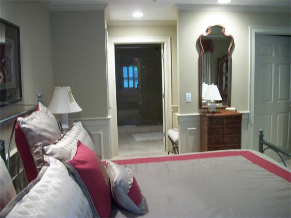 8 Sauta Farm Way, Unit 8 Hudson, MA 01749 - Photo 12 of 30 a bedroom with a bed and a mirror