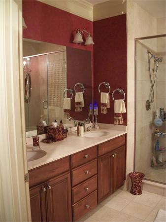 8 Sauta Farm Way, Unit 8 Hudson, MA 01749 - Photo 13 of 30 a bathroom with a granite countertop sink a mirror and shower