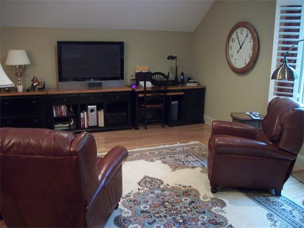 8 Sauta Farm Way, Unit 8 Hudson, MA 01749 - Photo 18 of 30 a living room with furniture and a fireplace