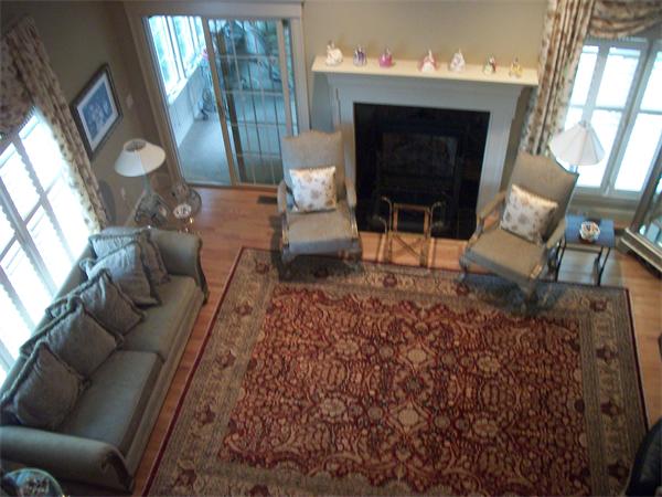 8 Sauta Farm Way, Unit 8 Hudson, MA 01749 - Photo 26 of 30 a living room with furniture and a fireplace