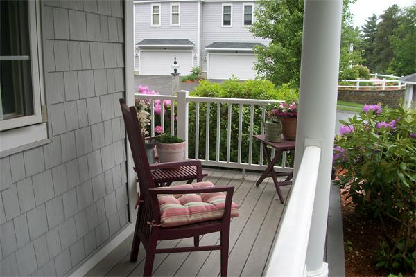 8 Sauta Farm Way, Unit 8 Hudson, MA 01749 - Photo 27 of 30 a view of balcony with two chairs and a potted plant