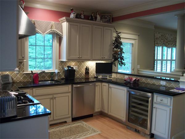 8 Sauta Farm Way, Unit 8 Hudson, MA 01749 - Photo 3 of 30 a kitchen with a sink stove and window
