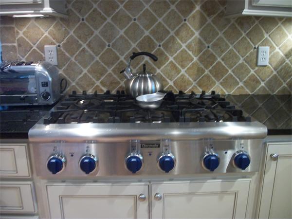 8 Sauta Farm Way, Unit 8 Hudson, MA 01749 - Photo 5 of 30 a close view of a stove top oven