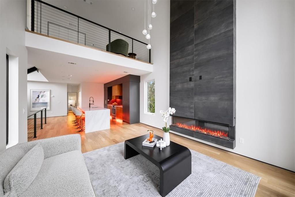 172 Racine Street Southwest Atlanta, GA 30314 - Photo 2 of 32 a living room with furniture and a fireplace