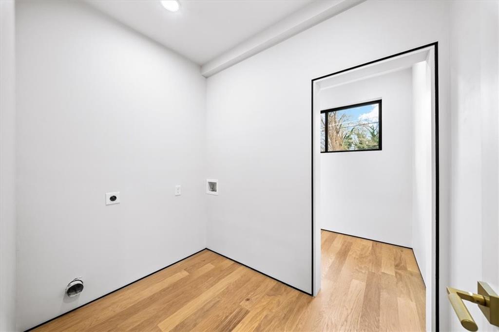 172 Racine Street Southwest Atlanta, GA 30314 - Photo 26 of 32 a view of empty room with wooden floor