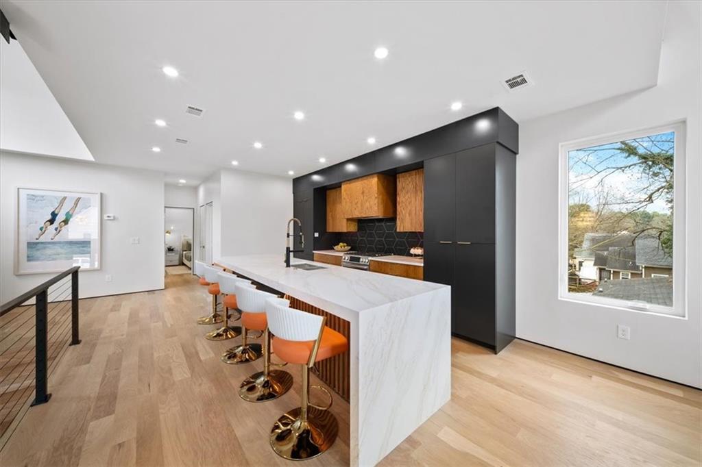 172 Racine Street Southwest Atlanta, GA 30314 - Photo 3 of 32 a living room with furniture and a flat screen tv