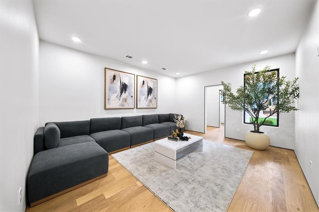 172 Racine Street Southwest Atlanta, GA 30314 - Photo 7 of 32 a living room with furniture potted plant and window