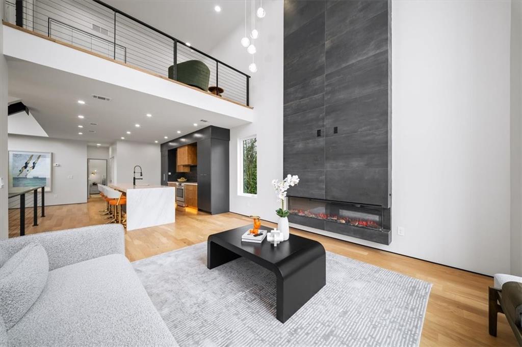 172 Racine Street Southwest Atlanta, GA 30314 - Photo 9 of 32 a living room with furniture and kitchen view