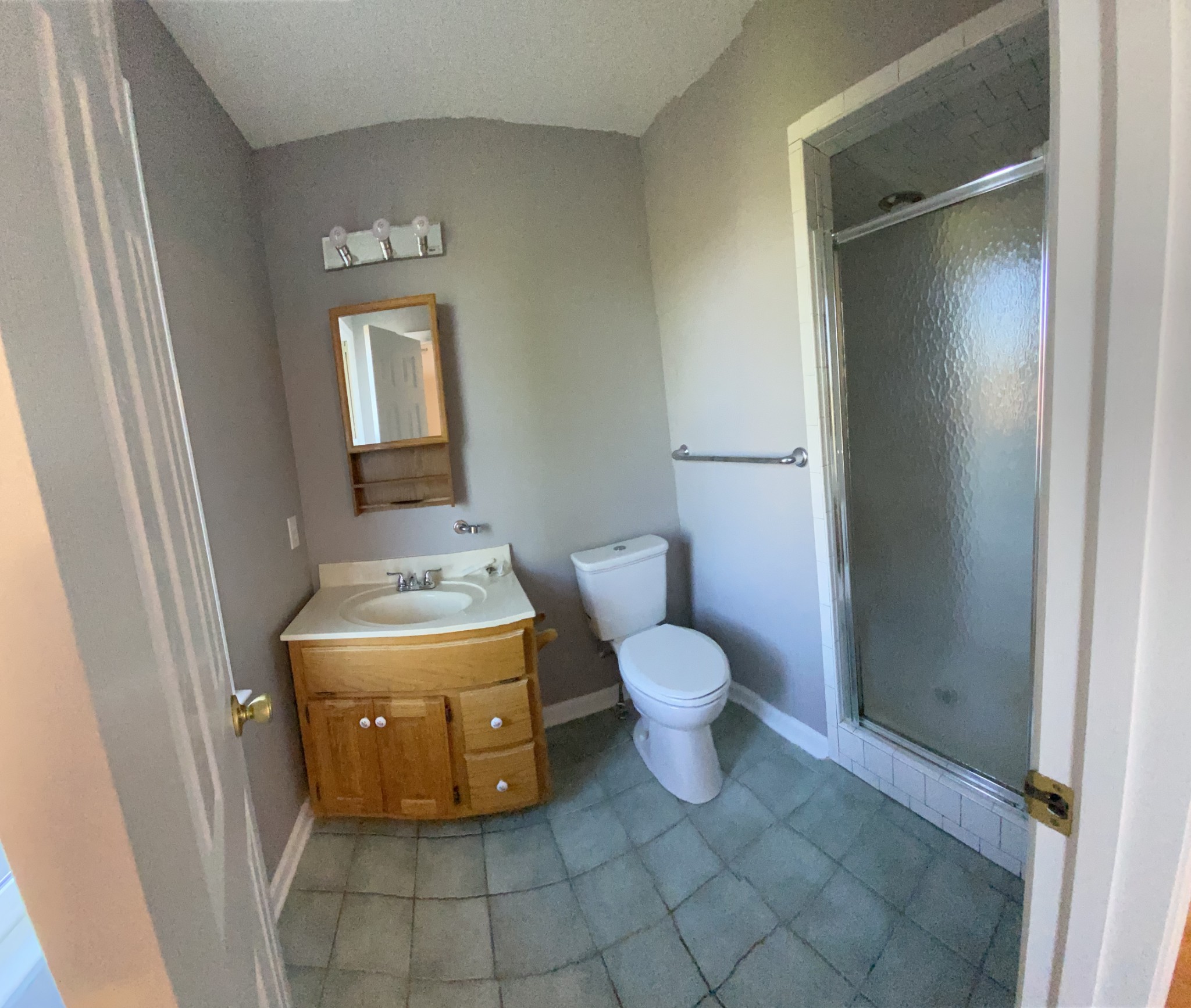 1370 Shelly Road Decherd, TN 37324 - Photo 39 of 44 a bathroom with a toilet a sink and mirror