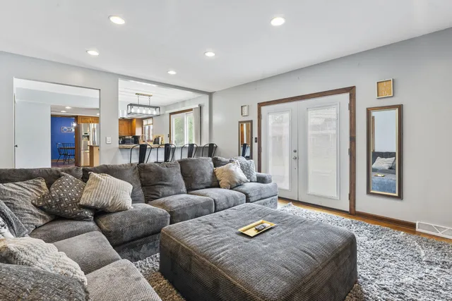 a view of a hallway with storage and utility room