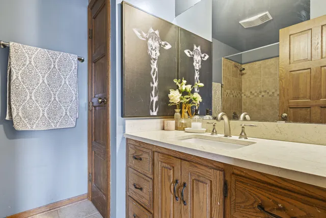 a bedroom with bed and a window