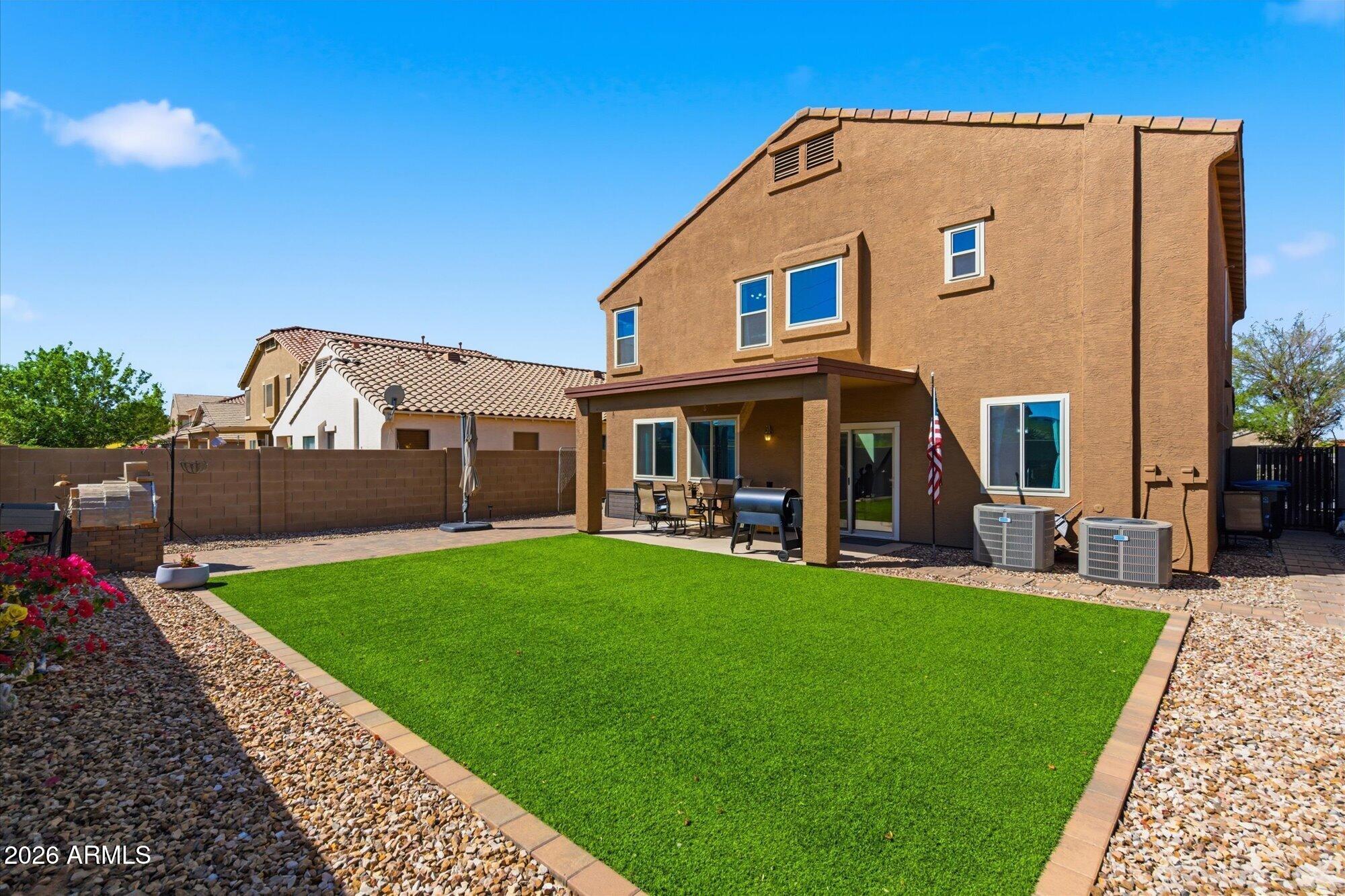 21915 Dietz Drive Maricopa, AZ 85138 - Photo 30 of 31 a view of a house with a yard
