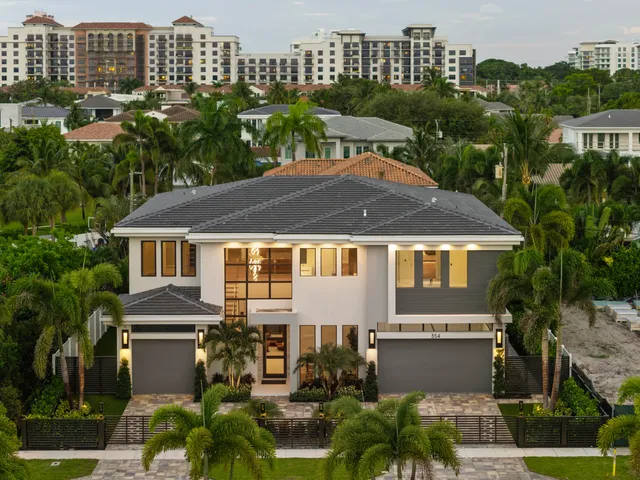 a living room with furniture and large window
