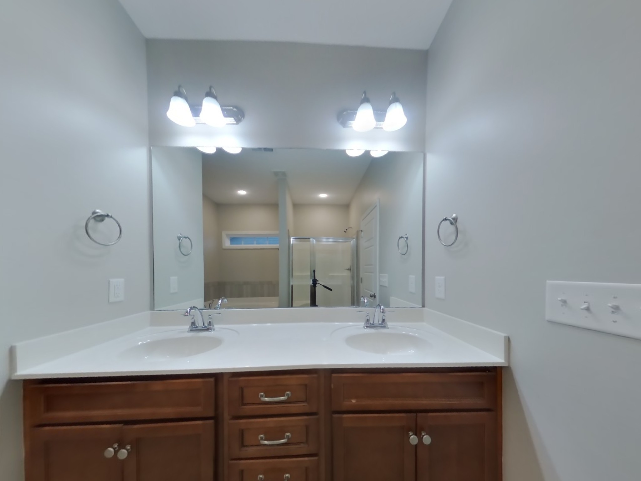 809 Ellyson Drive Spring Hill, TN 37174 - Photo 10 of 17 a bathroom with a sink double vanity and a mirror