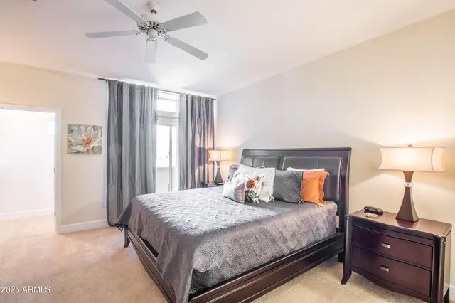 a bedroom with a bed and window