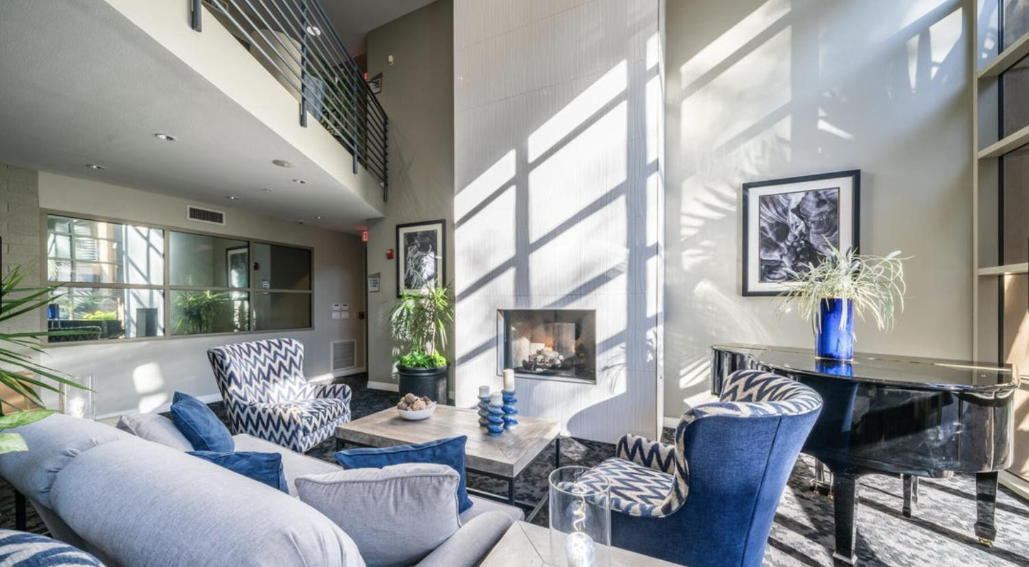 1701 East Colter Street, Unit 388 Phoenix, AZ 85016 - Photo 21 of 22 a living room with furniture and a large window
