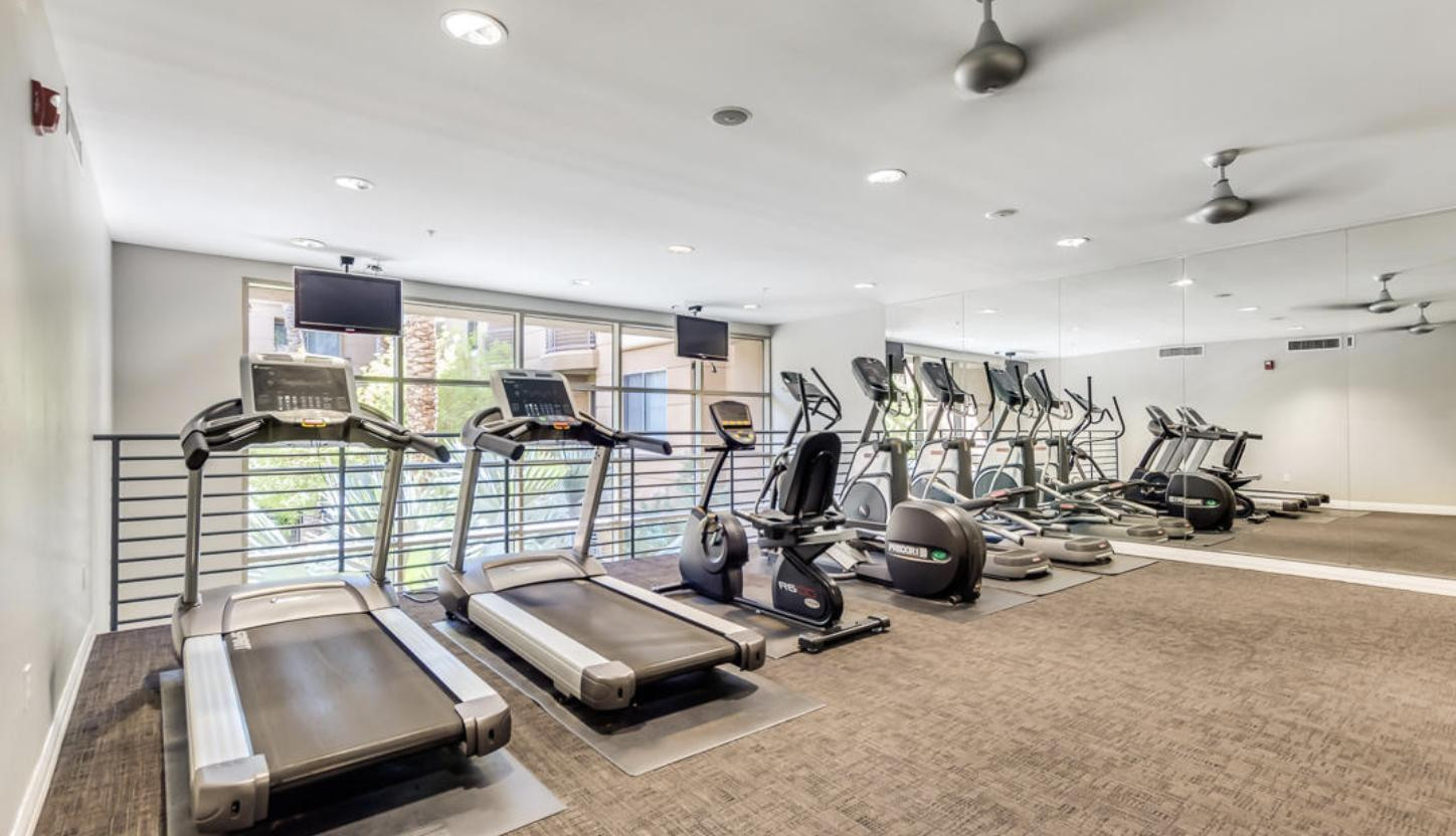 1701 East Colter Street, Unit 388 Phoenix, AZ 85016 - Photo 7 of 22 a view of a room with gym equipment