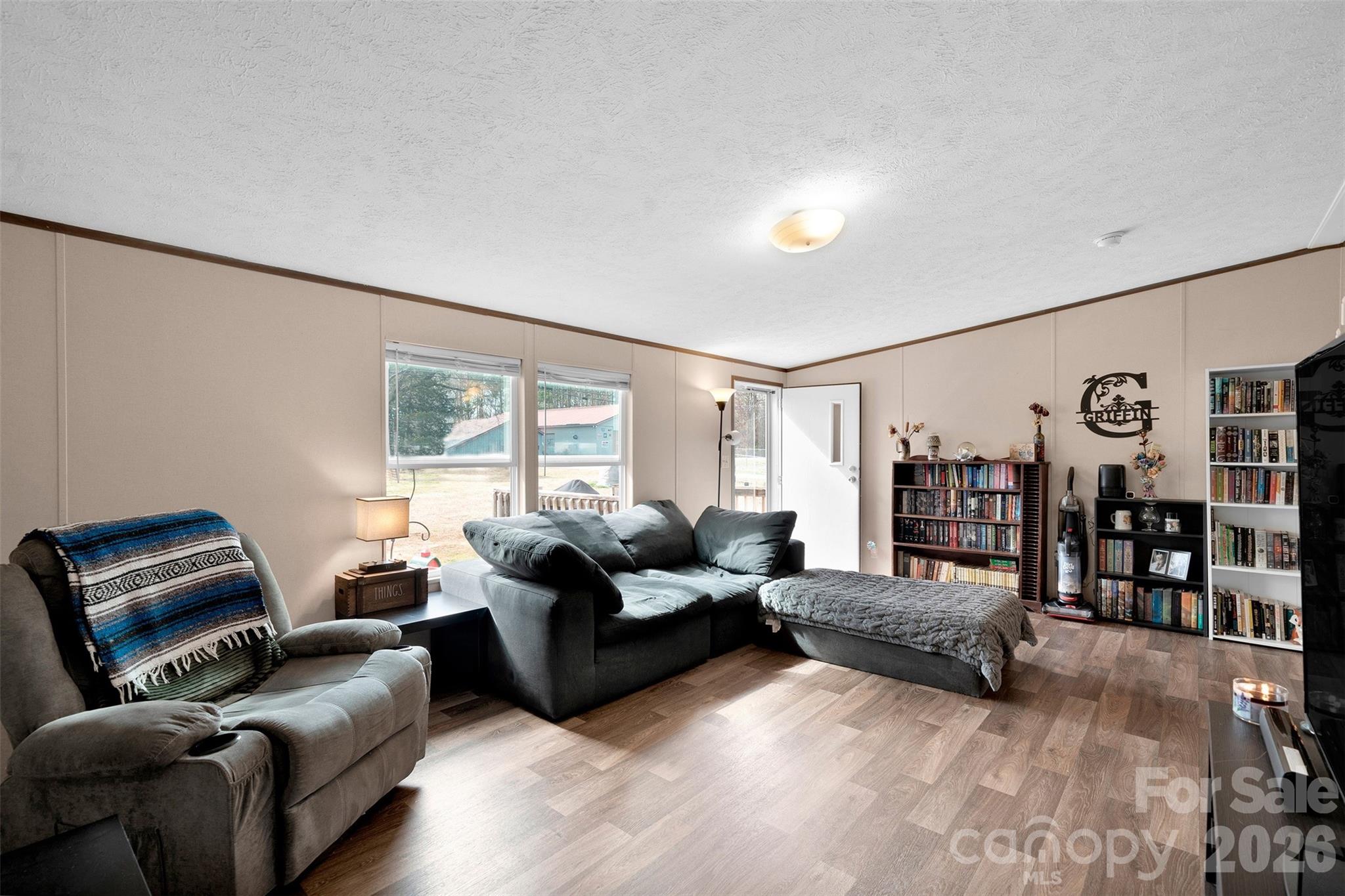 812 Dallas Spencer Mountain Road Dallas, NC 28034 - Photo 4 of 35 a living room with furniture and a window