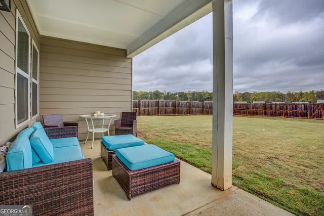 a sitting area with furniture and city view