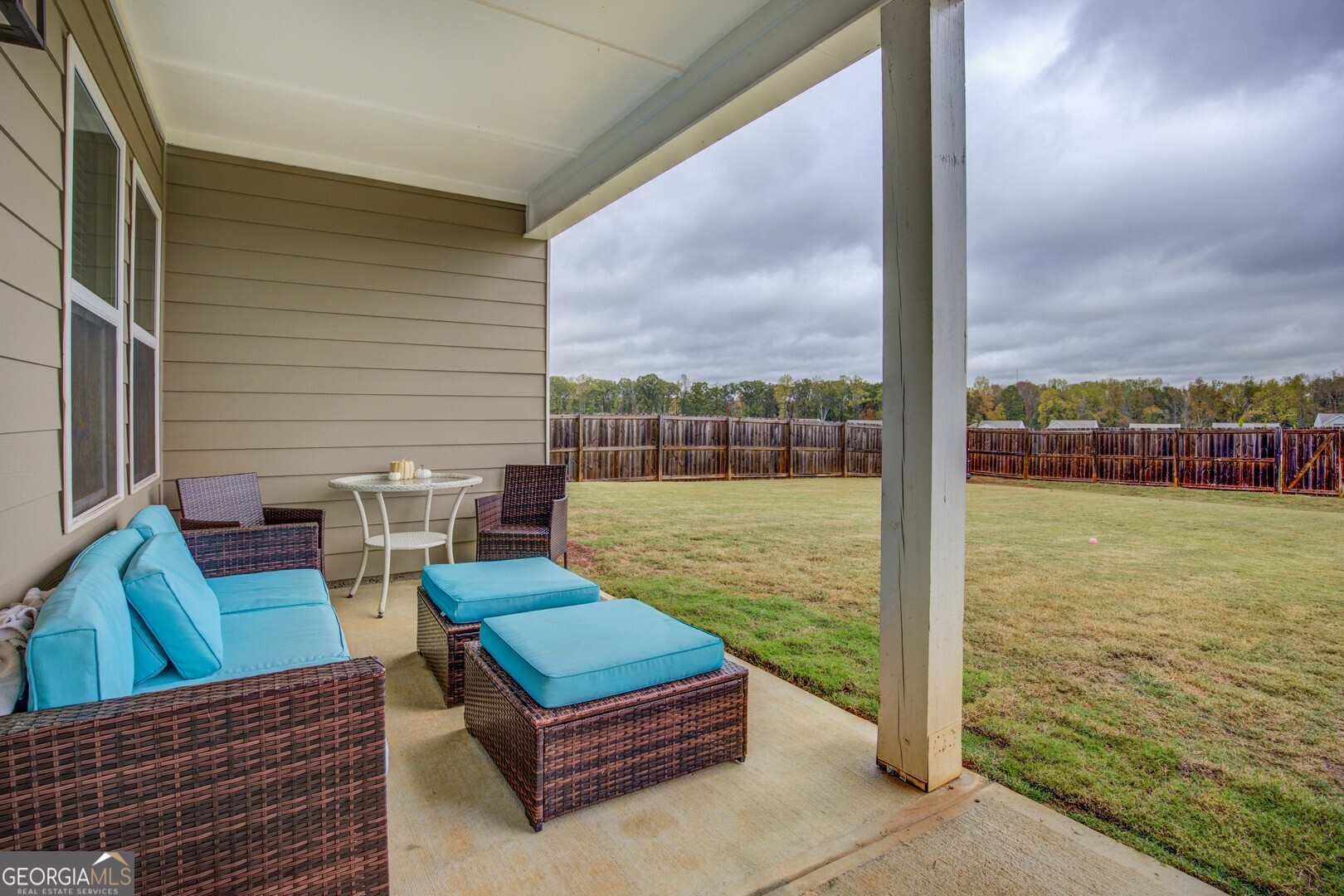 39 Dorsey Way Monroe, GA 30655 - Photo 37 of 44 a sitting area with furniture and city view