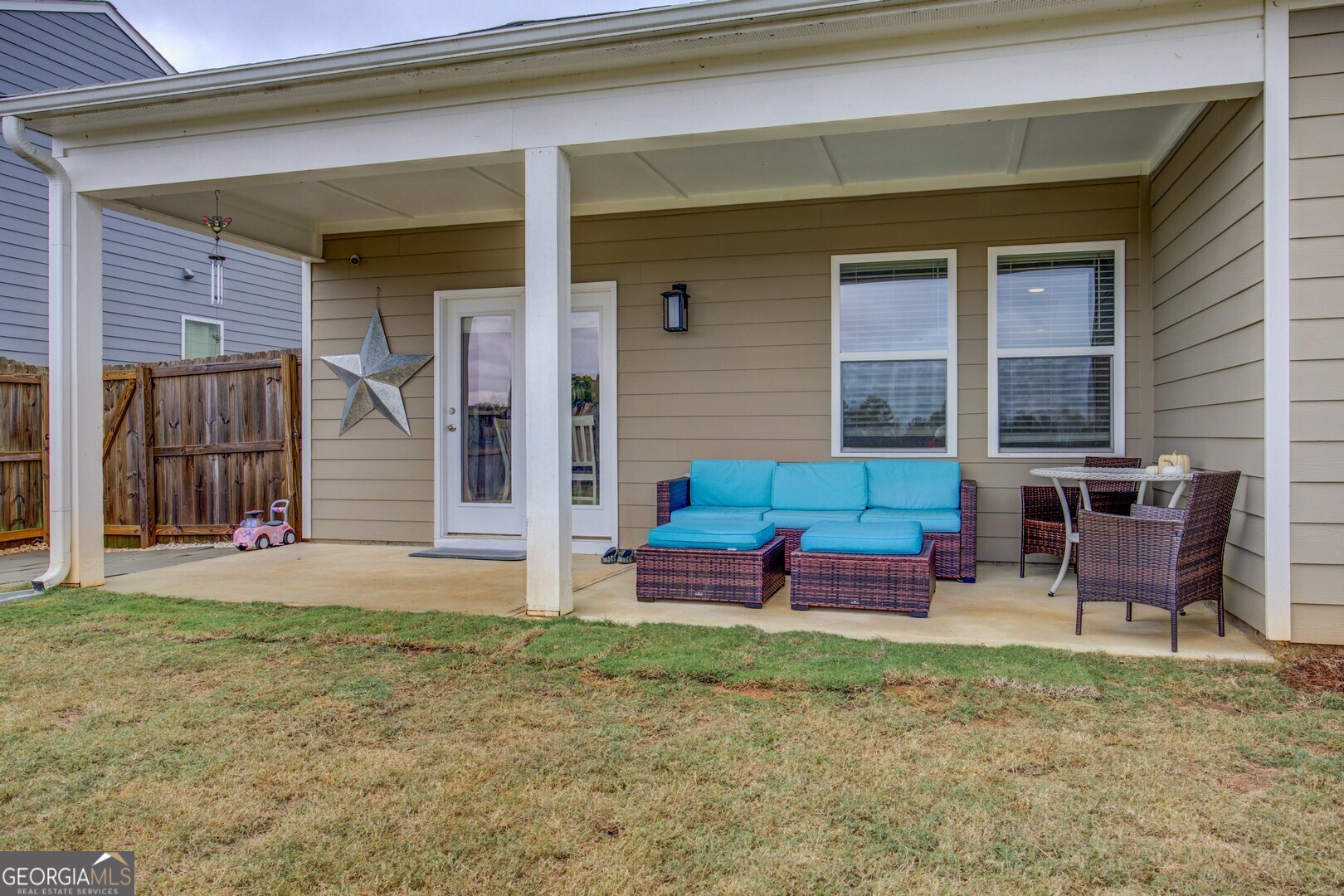 39 Dorsey Way Monroe, GA 30655 - Photo 41 of 44 a view of a house with backyard porch and outdoor seating