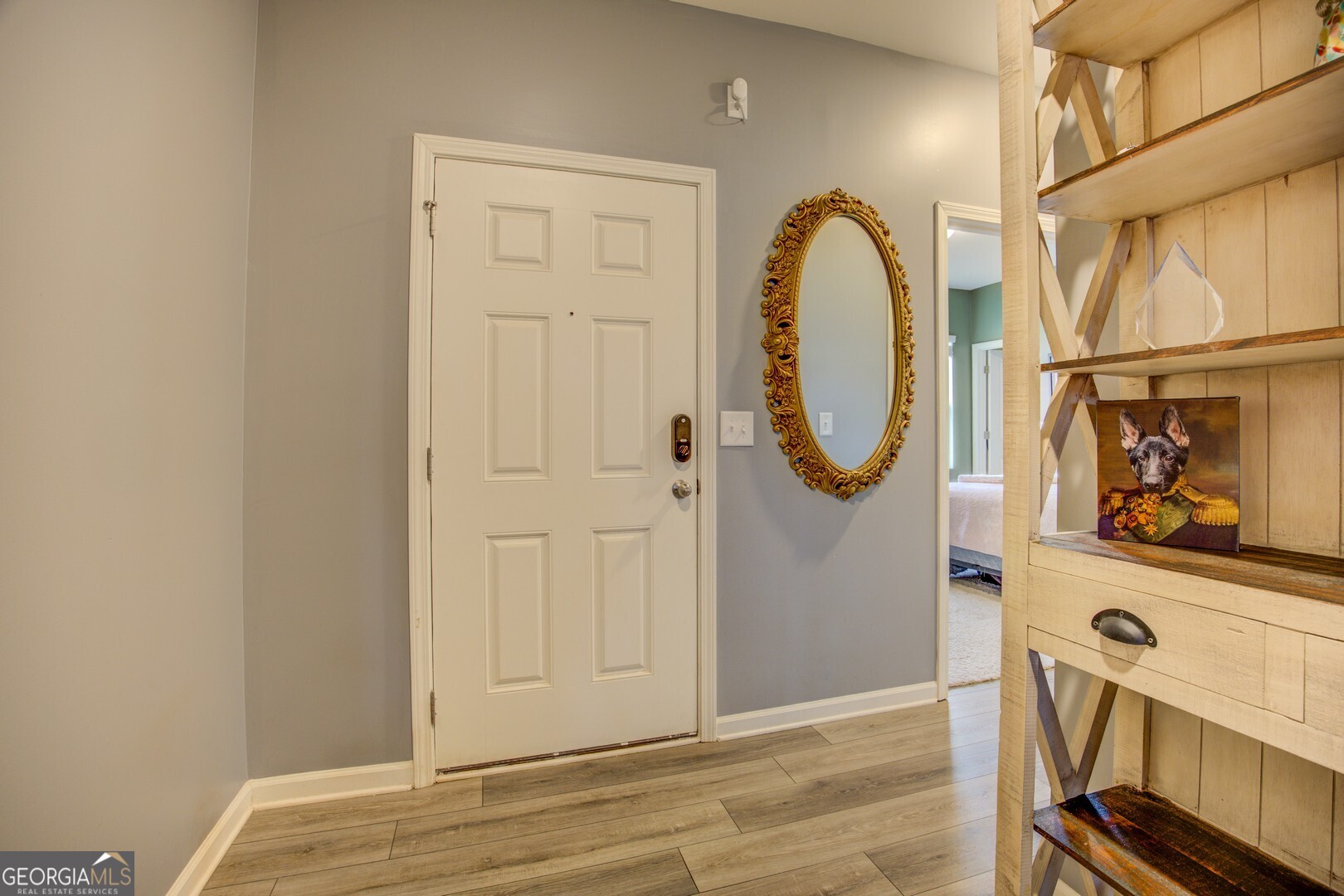 39 Dorsey Way Monroe, GA 30655 - Photo 8 of 44 a view of an entryway with wooden floor