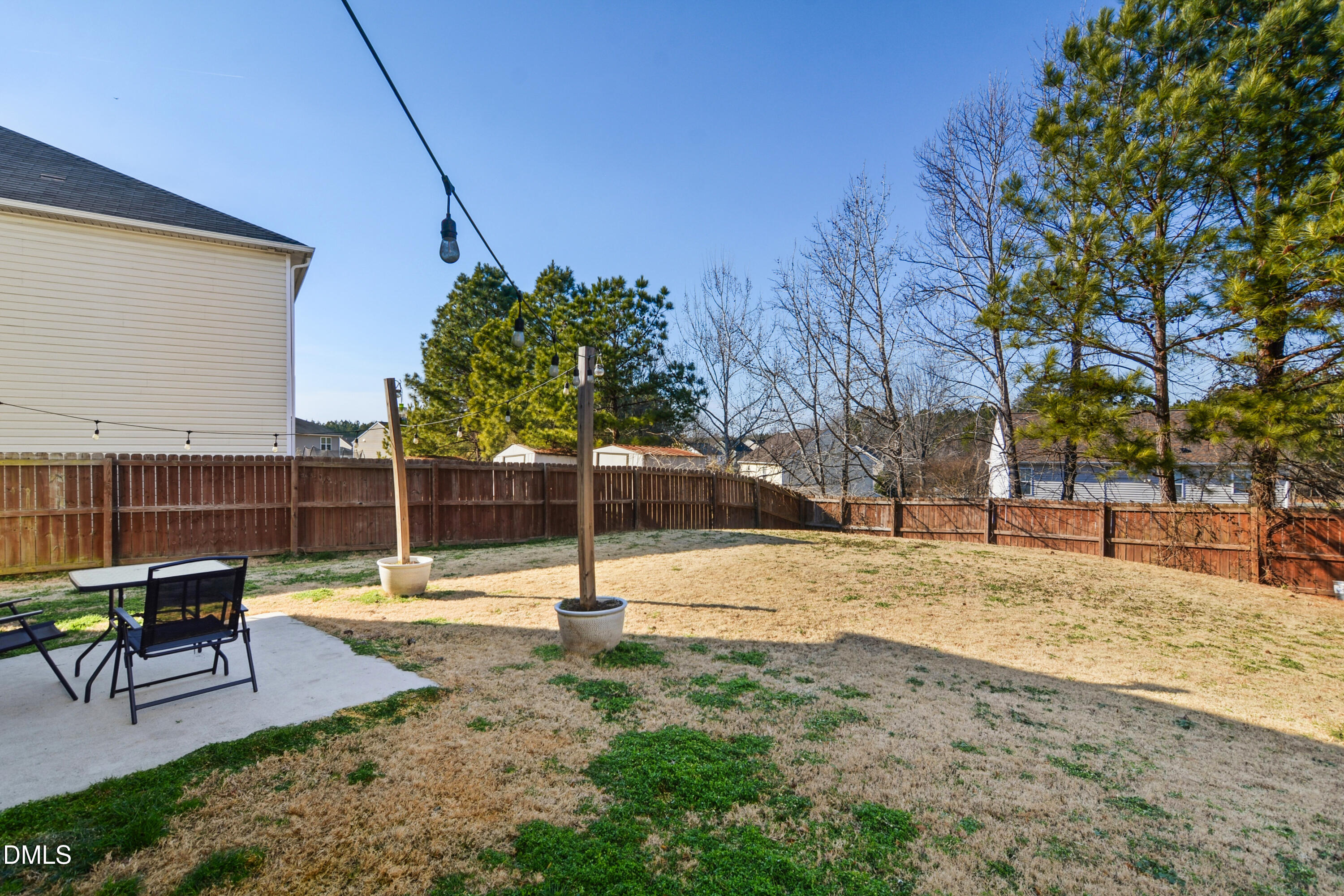 Undisclosed Address Durham, NC 27704 - Photo 19 of 21 a view of a backyard with a slide