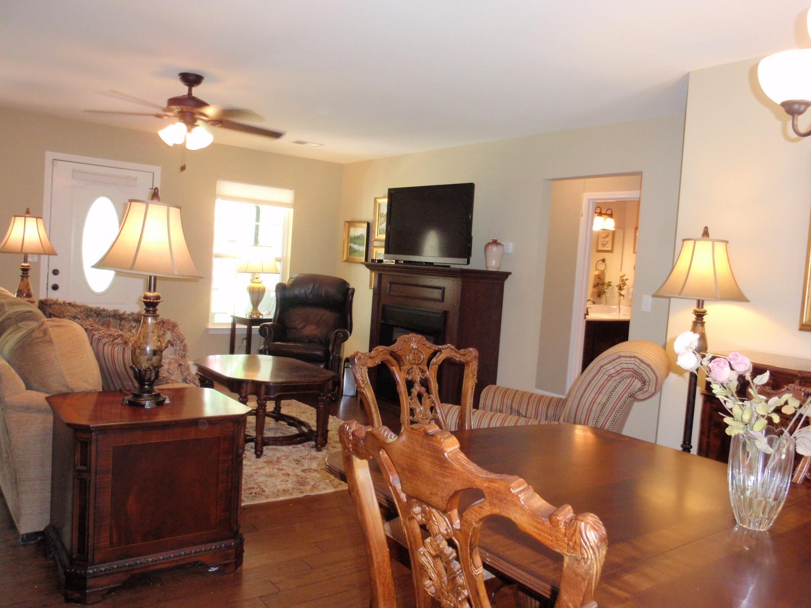 206 Black Road Dickson, TN 37055 - Photo 12 of 22 a living room with furniture fireplace and a flat screen tv