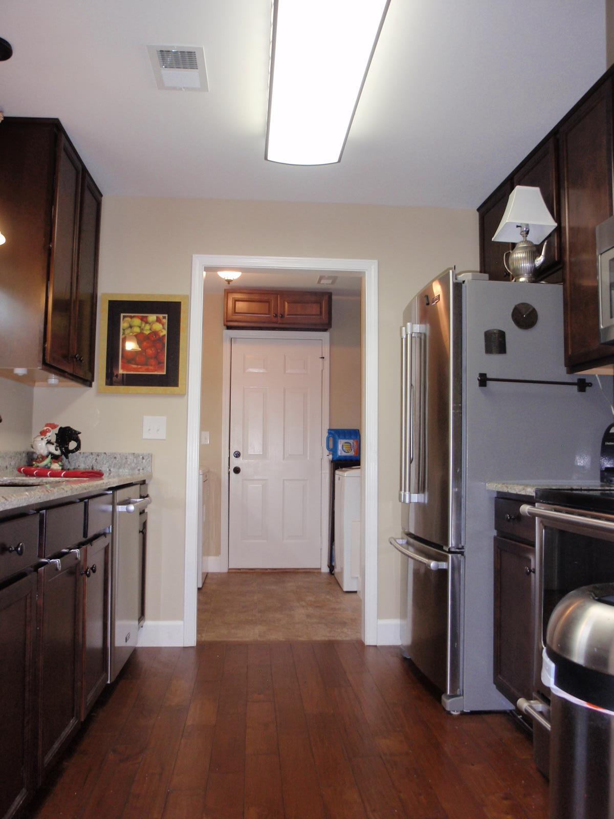 206 Black Road Dickson, TN 37055 - Photo 13 of 22 a kitchen with stainless steel appliances a refrigerator and a stove top oven