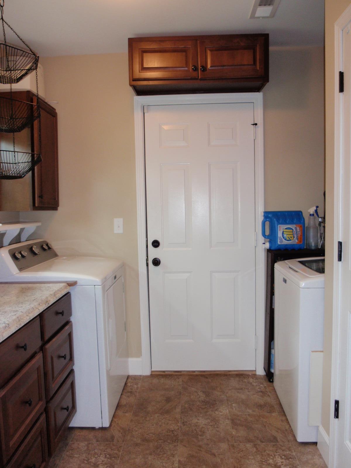 206 Black Road Dickson, TN 37055 - Photo 15 of 22 a view of storage and utility room