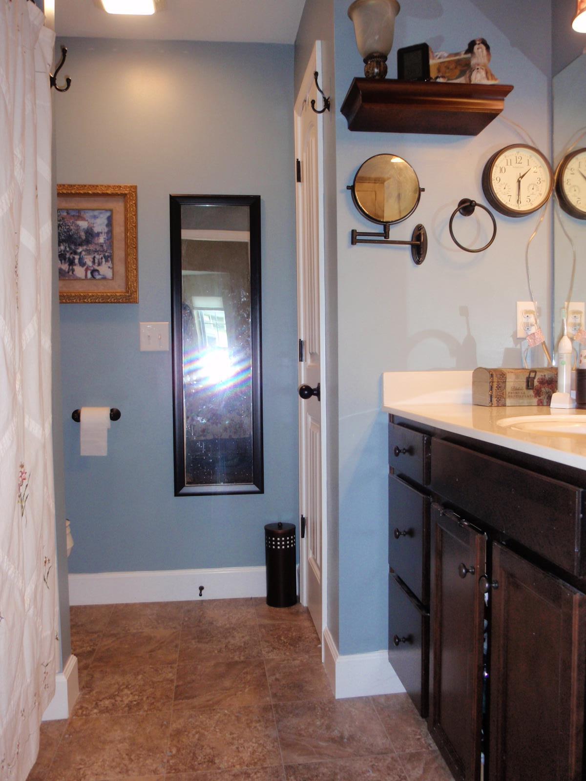 206 Black Road Dickson, TN 37055 - Photo 18 of 22 a bathroom with a sink and a mirror