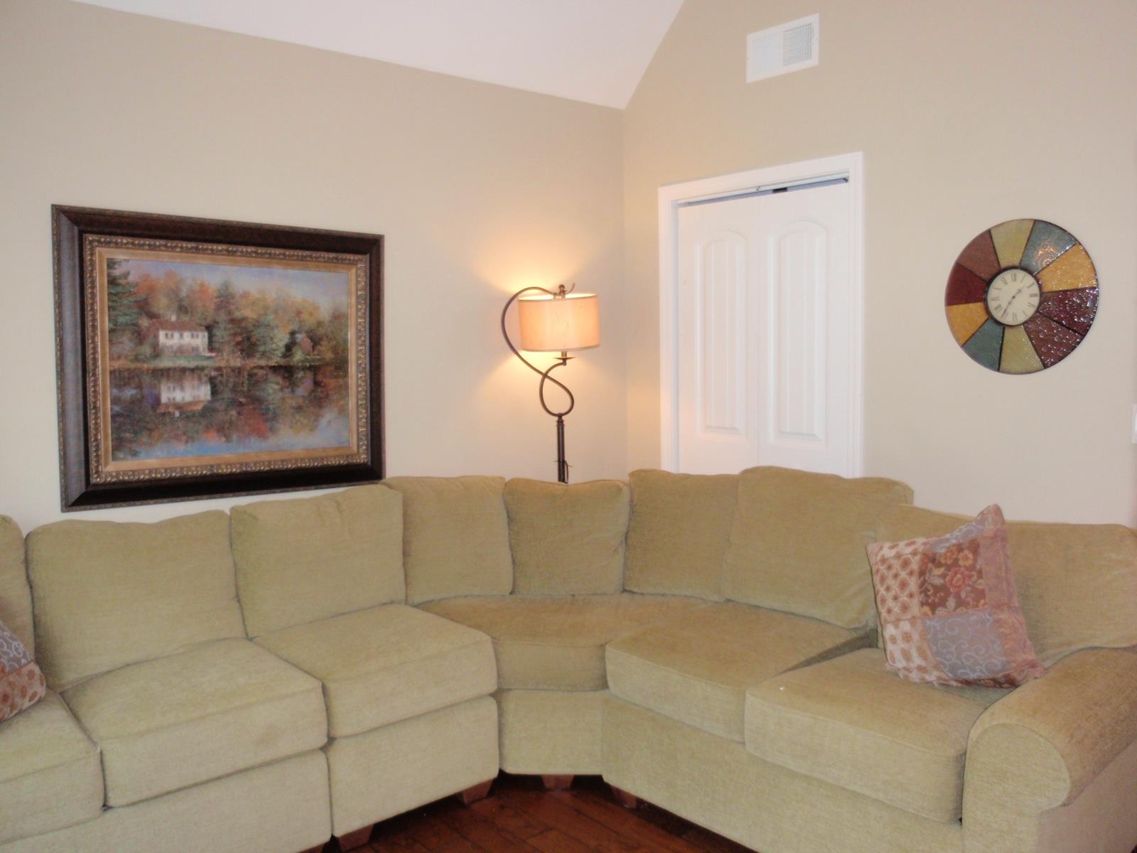 206 Black Road Dickson, TN 37055 - Photo 20 of 22 a living room with couches and a potted plant