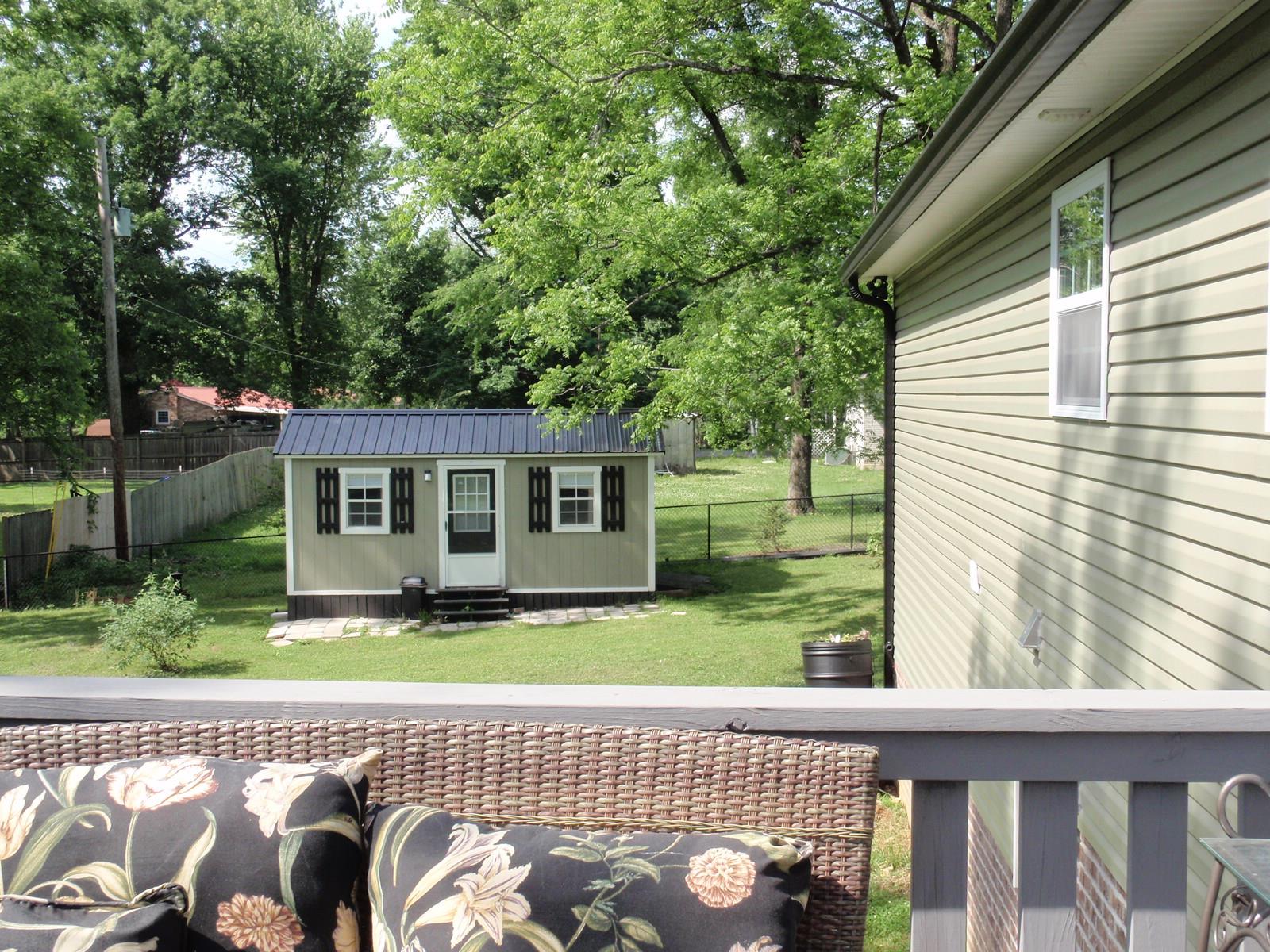206 Black Road Dickson, TN 37055 - Photo 3 of 22 a view of a house with a backyard